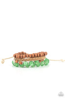 Paparazzi - Down HOMESPUN - Green Bracelets New Arrivals-Lovelee's Treasures-bracelets,glassy green cat's eye beads,green,jewelry,new arrivals,paparazzi,sliding knot closure